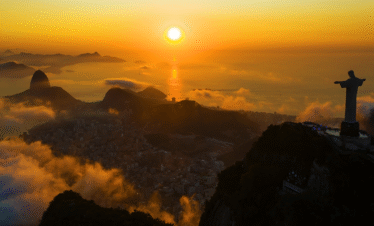 Sunrise over Christ the Redeemer and Sugarloaf Mountain